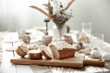 Close up of homemade Easter baked goods on festive table.