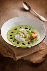 cod fillet and shrimp over zucchini cream and balsamic vinegar drops