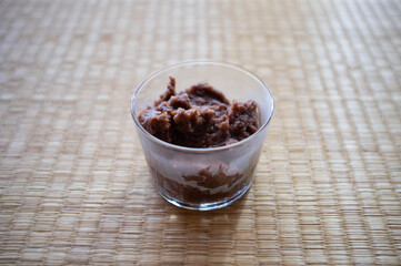 A sweet red bean paste on tatami.