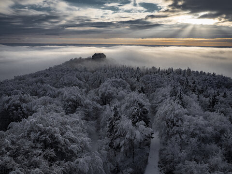 Magnificent view from Watchtower in the mountains during the winter. Land covered by snow, peace in soul during amazing sunset. - Powered by Adobe