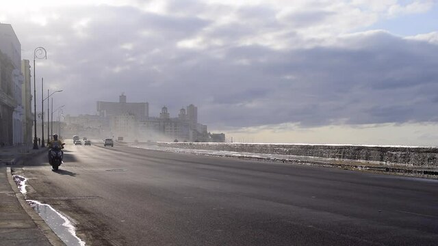 Establishing shot of 'El Malecon' in Havana, Cuba