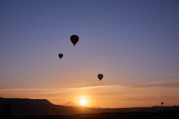 Hot air balloons at sunrise in Cappadocia, Turkey
