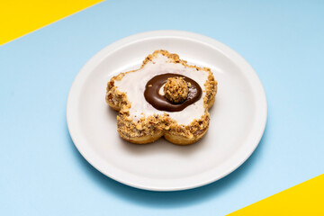  Donut on blue and  yellow background