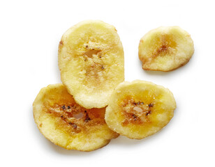 dried banana chips isolated on white background, top view