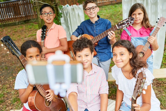 Group of children as a band at the talent show