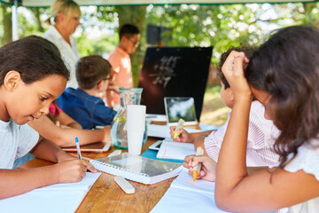 Children study hard in the summer tutoring course