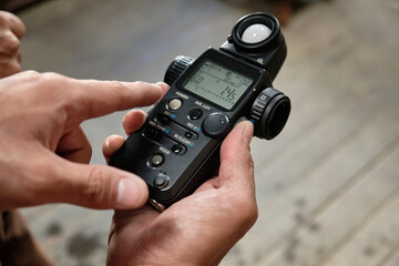Testing the light exposure with a light meter