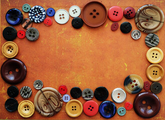 Frame made of various buttons. Background, handmade concept