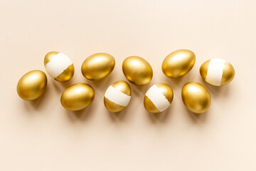 Set of golden eggs. Easter decoration. Wealth and good luck concept. Overhead view