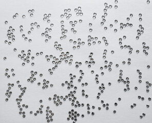 rhinestones on a gray background, top photo