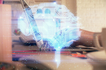 Double exposure of woman hands working on computer and brain hologram drawing. Ai concept.