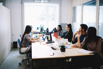 Group of colleagues spending time in office