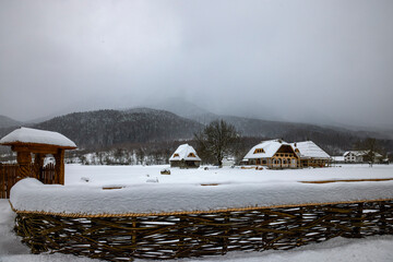 beautiful traditional Romanian house in the mountain area in winter