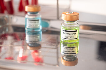 Ampoules with Coronavirus vaccine. Healthcare And Medical concept.
