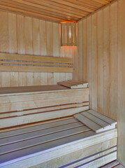 Fototapeta na wymiar Interior of the empty new wooden sauna