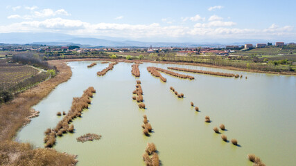aerial view of la paul lagoon woth laguardia town at background, Spain