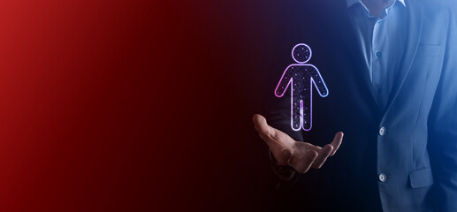 Businessman holds man person icon on dark tone background.HR Human ,people iconTechnology Process System Business with Recruitment, Hiring, Team Building. Organisation structure concept