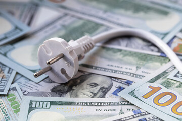white plug on dollar banknotes