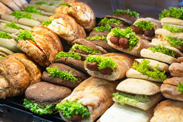 Burgers, sandwich and hotdogs on showcase