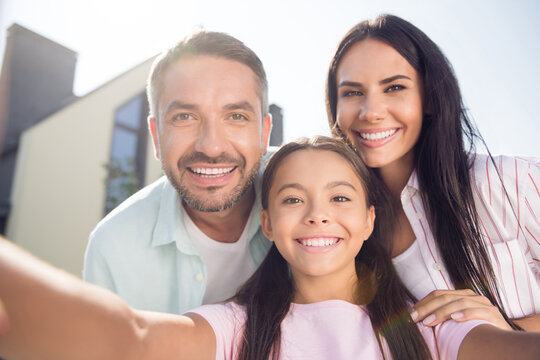 Portrait of cheerful lady guy little girl make selfie beaming smile have great mood hanging out outdoors