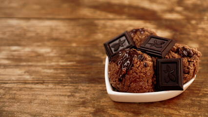 Homemade chocolate ice cream with chocolate pieces in a white bowl