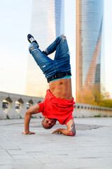 breakdancing man dancing in town