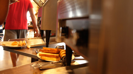 Machine for making toast in the hotel restaurant.