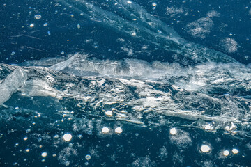 Cracked Ice of Frozen Baikal Lake in Winter. Top Down View