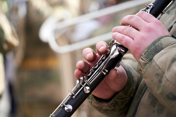 musicians of the military brass band plays the musical instruments