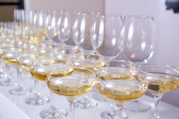 A lot of Glass with white wine