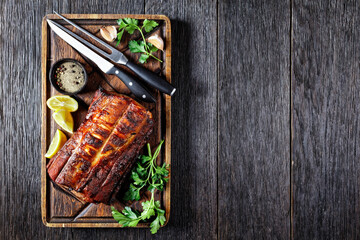 Barbecued Pork Loin Roast on a wooden board