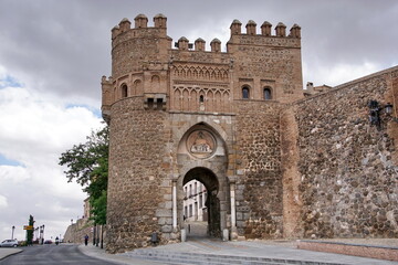 Toledo Puerta del Sol door in Castile La Mancha of Spain - obrazy, fototapety, plakaty