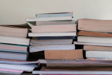 Books stacked on top of each other. Concept of literature and learning.
