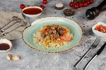 Rice pilaf with lamb meat and vegetables