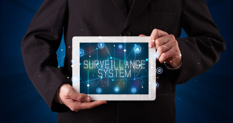 Person holding tablet, security concept