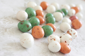 Spotted muted colored chocolate drops