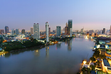 Fototapeta na wymiar Sunset at Chao Phraya river in Bangkok, Thailand
