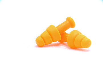 Orange ear plug isolated on white background