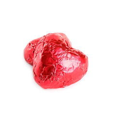 Heart shaped chocolate candies on white background