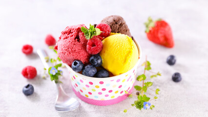 scoop of chocolate,  strawberry and mango ice cream