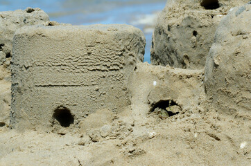 close up of a sand gate and tower of a sand castle