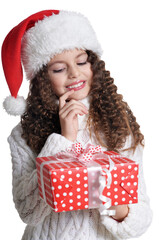 Portrait of smiling little girl with Christmas present
