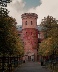 Obraz premium The medieval building Kungshuset (The Kings House) in the park Lundagård in Lund Sweden during autumn