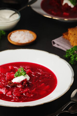 A plate with Ukrainian national dish - borsch	