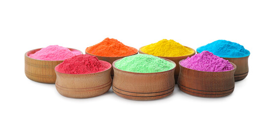 Colorful powder dyes in bowls on white background. Holi festival