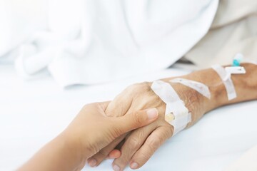 hands of the doctor with patient.