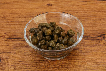 Tasty capers in the bowl