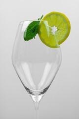 Wine glass with lemon