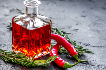 chili oil with ingredients on kitchen table background mock up
