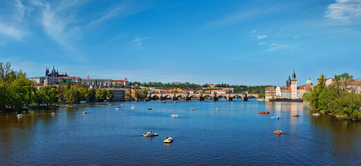 Obraz premium Panoramic view of Vltava river, Charles bridge and Gradchany Prague Castle 